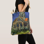 Bolsa Tote Igreja em Auvers-sur-Oise por Vincent van Gogh<br><div class="desc">A Igreja em Auvers por Vincent van Gogh é uma pintura arquitetônica de apos impressionismo de arte vintage. Uma vista exterior de uma igreja com janelas de vidro manchadas e uma figura caminhando em direção à Capela ao longo de um caminho de pedra. Sobre o artista: Vincent Willem van Gogh...</div>
