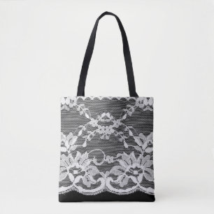 Bolsa Tote Lace floral branco sobre fundo preto.