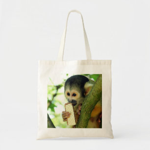 Bolsa Tote Macaco-esquilo-do-bebê giro comendo um biscoito de