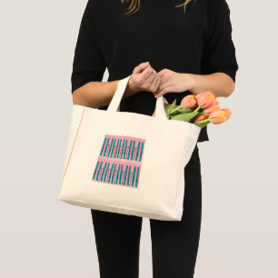Bolsa Tote Mini Esquis Blues em fundo rosa