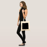 Bolsa Tote Minimalist Black Cat Silhouette<br><div class="desc">Stylish black cat silhouette in minimalist style – perfect for Halloween, pet lovers, and chic everyday gifts. Add a touch of mysterious charm and feline elegance to your lifestyle with this minimalist black cat silhouette design. Featuring a sleek and sophisticated illustration of a black cat in profile, this versatile artwork...</div>