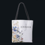 Bolsa Tote Monograma de Flores Silvestres do Prado Rústico<br><div class="desc">Este simples mas elegante design de bolsa tote com monograma apresenta um buquê rústico em aquarela de flores silvestres roxas,  amarelas,  brancas e bordô do prado com folhagens. Também faz um ótimo presente para madrinhas! Criado por Simply Farmhouse Press.</div>
