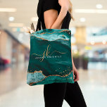 Bolsa Tote Monograma de Letra Dourada de Agato Teal Turquoise<br><div class="desc">Saco de tota moderno, elegante, com agato de tara turquesa e acentos de brilho e brilho dourado personalizados com iniciais e nome de monograma manuscrito de guião feminina. design de luxo na moda. ASSISTÊNCIA: para obter ajuda com a modificação ou personalização do design, alteração de cor, transferência do design para...</div>