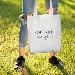 Bolsa Tote Motivação Positiva Você Já É Suficiente<br><div class="desc">Procurando um lembrete diário de que você é suficiente? Não olhe mais! Apresentamos nossos produtos de citação "Você é Suficiente", projetados para fornecer motivação positiva e elevar seus espíritos sempre que precisar. Com esses produtos inspiradores, você pode carregar a empoderante mensagem de autoaceitação e autoamor com você aonde quer que...</div>