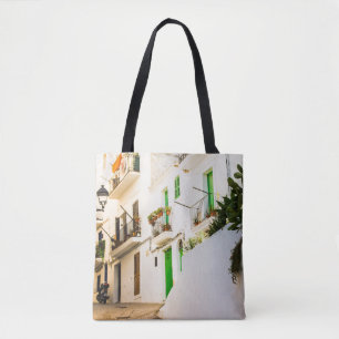 BOLSA TOTE MOTOCICLO PRETO PERTO DA CONSTRUÇÃO DE PAREDE BR