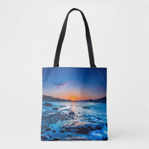 Bolsa Tote Nascer do sol sobre o horizonte no litoral no