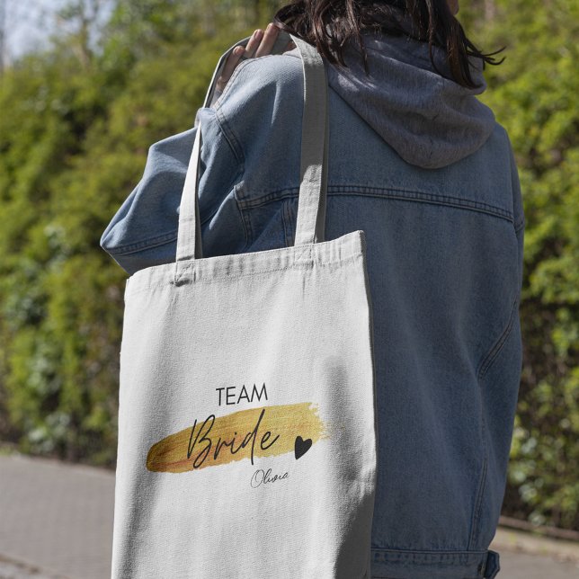 Bolsa Tote Noiva Personalizada da Equipe Moderna de Chic Dour (Personalized Gold & Black Modern Chic Team Bride Tote Bag)