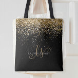 Bolsa Tote Nome do Monograma do Glitter Dourado<br><div class="desc">Glitter Dourado Monograma Elegante Bag Tote. Personalize facilmente este design de saco de tota de chic com elegante brilho dourado sobre fundo preto. O design apresenta seu monograma manuscrito com espirais bonito e seu nome.</div>