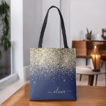 Bolsa Tote Nome do Monograma do Sparkle Glitter Glitter Azul<br><div class="desc">Marinho Azul e Dourado Faux Sparkle e Glitter Elegante Monograma Bag. Este Livro Bag pode ser personalizado para incluir seu nome inicial e próprio e ser dado como presente para o Natal,  Doce 16 Aniversário,  Chá de panela ou Casamento.</div>