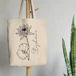 Bolsa Tote Nome Elegante do Script Lotus Julho Baixo Mês<br><div class="desc">Lily de água ou flor de lótus elegante,  minimalista e moderna,  flor do mês de nascimento de julho com nome personalizável em roteiro elegante,  presente personalizado para qualquer ocasião,  incluindo aniversários,  presentes para madrinhas,  melhores amigos,  Natal e muito mais.</div>
