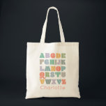 Bolsa Tote Nome Personalizado do Alfabeto ABC<br><div class="desc">Um design alfabético colorido e retrô que pode ser personalizado para uma criança. Inspirado por letras retrorreflectoras e design boho,  este cobrir pode ser personalizado com um nome,  monograma ou outro texto. Cores neutras em termos de gênero; púrpura,  verde,  laranja,  amarela,  lacre,  turquesa,  cinza,  castanho,  creme.</div>