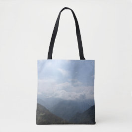 Bolsa Tote Nuvens sobre a fotografia azul do Céu Colinas