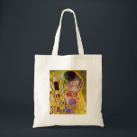 Bolsa Tote O beijo por Gustavo Klimt<br><div class="desc">Esta pintura intitulada o beijo é feita pelo artista famoso, Gustavo Klimt. Sobre Gustavo Klimt Gustavo Klimt era um pintor do Symbolist e austríacos dos membros os mais proeminentes do movimento da separação de Viena. Transformou-se um dos membros fundadores e do presidente do Wiener Sezession em 1897 e do sacro...</div>