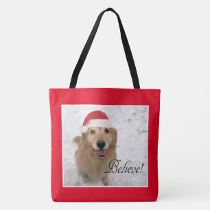 Bolsa Tote O cão do golden retriever acredita o Natal