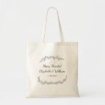 Bolsa Tote Obrigado botânico da videira do casamento rústico<br><div class="desc">Surpreenda seu convidados ou partido nupcial com esta sacola que caracteriza uma videira desenhado mão rústica simples e três linhas de texto feito sob encomenda. Adicione seu cumprimento, os nomes dos noivos, data do casamento ou o que texto você gosta. Adicione petiscos e outros artigos ao bolsa para criar um...</div>