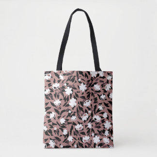 Bolsa Tote Padrão floral sobre fundo leopardo.