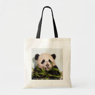 Bolsa Tote Panda gigante que inclina-se contra a parede