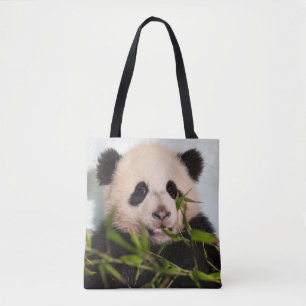 Bolsa Tote Panda gigante que inclina-se contra a parede