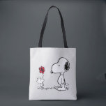 Bolsa Tote Peanuts | Snoopy & Woodstock Red & Black<br><div class="desc">Bring the timeless charm and heartfelt friendship of Peanuts' Snoopy and Woodstock into your life with this delightful collection, featuring their iconic red flower moment. This classic illustration captures Woodstock sweetly presenting a flower to his best pal, making every item in this collection a pure joy to own or gift!...</div>