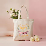 Bolsa Tote Personalized Happy Mother’s Day Floral Tote Bag<br><div class="desc">Celebrate Mom with this elegant Happy Mother’s Day floral tote bag featuring soft pink blossoms, delicate greenery, and beautiful golden accents arranged in a graceful wreath design. The warm, stylish lettering adds a cheerful and modern touch. Customize this tote with her name, a special message, or meaningful date to create...</div>