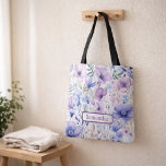 Bolsa Tote Personalized Purple Floral Name<br><div class="desc">Looking for a thoughtful and practical personalized gift? This Purple Floral Name Tote Bag is a beautiful everyday accessory designed to feel both meaningful and useful. Featuring a soft purple floral design with a custom name, this tote instantly becomes a personal keepsake. Simply add the name and preview exactly how...</div>