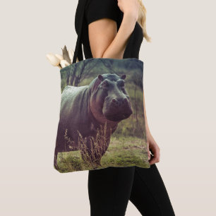 Bolsa Tote Posicionando Hippo na Câmara na Folhagem da Áfri