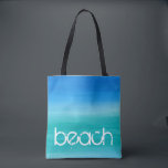 Bolsa Tote Praia Aquarela Oceano Azul Verde<br><div class="desc">Esta design de praia apresenta texto angustiado em uma cor d'água, azul e verde do oceano. Clique no botão personalizar para opções de modificação ou adição de texto! Variações deste design, cores adicionais, além de coordenar produtos estão disponíveis em nosso compro, zazzle.com/store/doodlelulu. Entre em contato conosco se precisar deste design...</div>