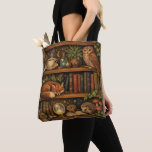 Bolsa Tote Retro book lover woodland animals<br><div class="desc">A cozy retro-inspired design featuring a charming bookshelf filled with vintage books,  delicate botanical accents,  cute woodland animals and a comforting cup of tea or coffee.</div>