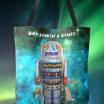 Bolsa Tote Robot retrô de galáxia, adicione seu nome<br><div class="desc">Eu adoro rostos retrorreflectores bonitos em robôs antigos, robôs de enrolar de brinquedos metálicos de infância. Aqui está um dos meus favoritos, colocado contra um céu de galáxia azul-turquesa. Seja um ladrão de tendências sempre que você usa este saco de tote de nome divertido, colorido e personalizado. Faz um presente...</div>