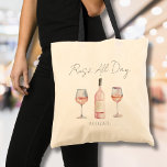 Bolsa Tote Rosé Engraçada O Dia todo do Vinho<br><div class="desc">Esta deliciosa bolsa de tote é perfeita para os entusiastas do vinho que se divertem um pouco com o seu estilo. Apresentando a frase brincalhona "Rosé All Day" no topo, ela é enfeitada com uma charmosa design de aquarela de dois copos de vinho e uma garrafa de vinho. A tipografia...</div>