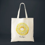 Bolsa Tote Rosquinha de Aquarela Amarela Cóplice com Sprinkle<br><div class="desc">Rosquinha de Aquarela Amarela Cuja Bandeja de Toque Personalizada Sprinkles | Saco de tota personalizável com rosquinha amarela de cor aquosa com aspersores coloridos. Esta bolsa de tote de rosquinha bonita será perfeita como um presente personalizado. Personalize adicionando um nome ou uma frase curta. Outras cores de rosquinha estão disponíveis....</div>
