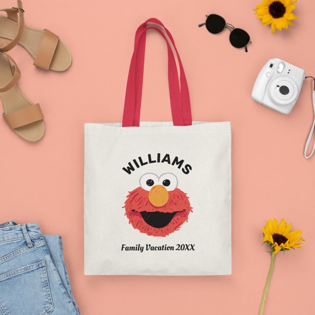Bolsa Tote Rua Sésamo | Férias Familiares Elmo (Tote bag on table)