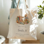 Bolsa Tote Santa Fe New Mexico Desert Wedding Welcome<br><div class="desc">A warm, hand-painted watercolor tote featuring a curated Santa Fe vignette filled with adobe architecture, turquoise accents, desert botanicals, pottery, and a soft Southwest sunset palette. Designed as a chic welcome gift for your Santa Fe bachelorette weekend, this tote feels equal parts artful and practical. Personalized with the couple’s names...</div>