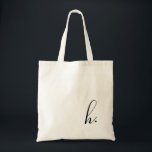 Bolsa Tote Script Inicial Preto Monograma Personalizado<br><div class="desc">Simples,  moderno e elegante. A cor do texto é totalmente personalizável. Perfeito como um presente para damas de honra,  lembrancinha de casamento,  presente de aniversário ou formatura. Parte de uma coleção da Parcel Studios.</div>