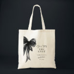 Bolsa Tote She’s Tying The Knot Black Bow Bridal Shower<br><div class="desc">Celebrate the bride-to-be with this She’s Tying The Knot Black Bow Bridal Shower Tote Bag, designed with a chic coquette-inspired black bow and elegant modern typography. Perfect for bridal showers, bachelorette celebrations, and wedding events, this stylish tote makes a thoughtful gift for the bride, bridesmaids, or guests. Ideal as a...</div>