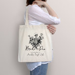 Bolsa Tote Skeleton Roses Bride or Die Bachelorette Party<br><div class="desc">Set the tone for your unique celebration with our Skeleton Roses Bride or Die Bachelorette Party Tote Bag. This gothic design features a skeleton with elegant floral accents, perfect for ladies who embrace a darkly romantic aesthetic. Invite your closest friends to join in the celebration of love and friendship with...</div>