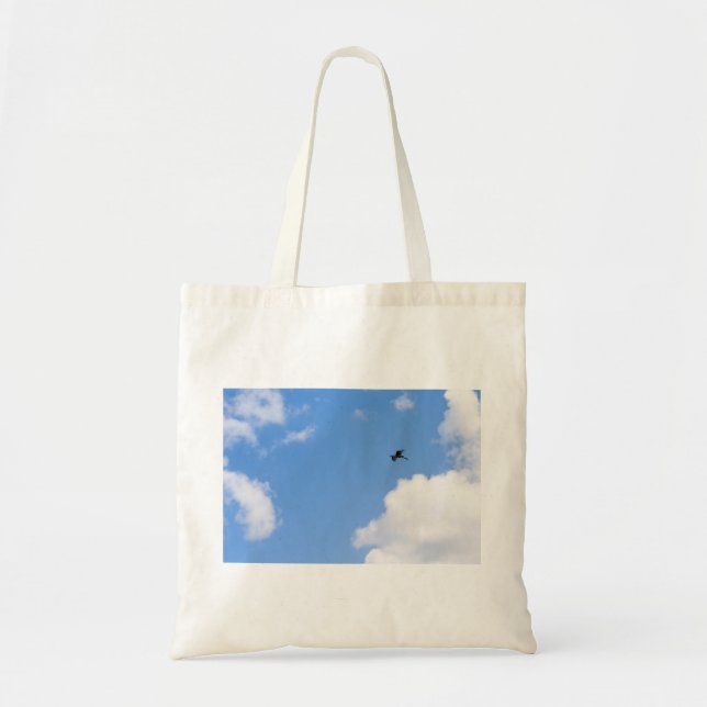 Bolsa Tote Solitary Bird Soaring Through Bright Blue Sky with (Frente)