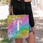 Bolsa Tote Sparkly Girly Rainbow Chunky Glitter Monograma<br><div class="desc">Um monograma de texto em dupla camada, com letra solteiro, roxo e preto, em branco. O tamanho, a cor e o estilo da fonte são personalizáveis. O fundo é uma falso brilho picante num arco-íris de cores (amarelo, dourado, rosa, roxo, azul, verde) com manchas cintilantes e bordas. Mova ou exclua...</div>