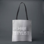 Bolsa Tote Suprimentos de Stylist para o Cabelo de Silver de<br><div class="desc">A beleza da Stylist para o cabelo de prata de luxo fornece sacos para tesouras, xampu ou outros materiais para salões. O nome do contato profissional e a profissão podem ser alterados para serem usados em qualquer tipo de negócio. Entre em contato com o designer para obter itens adicionais correspondentes....</div>