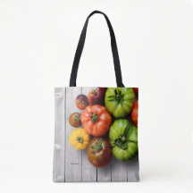 Tomates stripidos coloridos em Mesas com agentes a