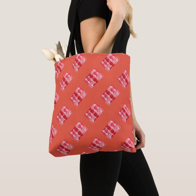 Bolsa Tote Tons vermelhos em círculo ou buracos, profundidade (Close Up)
