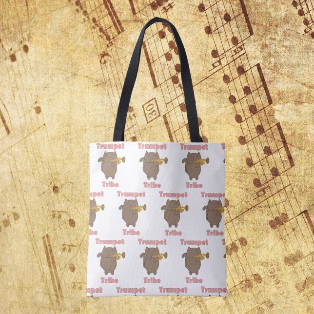 Bolsa Tote Trumpet Tribe Brown Cat Pattern (A tote bag with a pattern of a cat playing the trumpet and the words trumpet tribe in pink.)