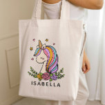 Bolsa Tote Unicorn Cute Whimsical Girly Personalized Name<br><div class="desc">Unicorn Cute Whimsical Girly Pink Floral Personalized Name Tote Bag features a cute unicorn with stars,  hearts and flowers. Perfect for back to school,  book bags for girls,  birthday party gifts and favors,  personalized Christmas gifts for girls and more. Designed by ©Evco Studio www.zazzle.com/store/evcostudio</div>
