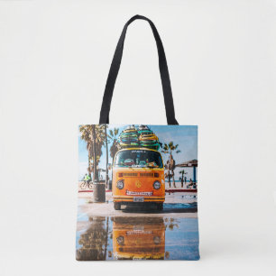 Bolsa Tote van laranja com prancheta no topo