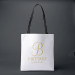 Bolsa Tote White Elegante e Dourada Bridesmaid Personalizada<br><div class="desc">Donativos Personalizados Elegantes de Bridesmaid que apresentam um monograma personalizado no estilo de fonte de script elegante dourado com o nome e o título da madrinha em estilo de fonte de serif clássico dourado. Também perfeito para Madrinha de casamento, Flor Girl, Mãe da Noiva e muito mais. Nota: Os detalhes...</div>