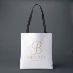 Bolsa Tote White Elegante e Dourada Bridesmaid Personalizada<br><div class="desc">Donativos Personalizados Elegantes de Bridesmaid que apresentam um monograma personalizado no estilo de fonte de script elegante dourado com o nome e o título da madrinha em estilo de fonte de serif clássico dourado. Também perfeito para Madrinha de casamento, Flor Girl, Mãe da Noiva e muito mais. Nota: Os detalhes...</div>
