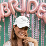 Boné Bride Personalized Bachelorette Party Cap<br><div class="desc">Celebrate the bride-to-be with this chic and fun personalized trucker hat — the perfect accessory for bachelorette parties, beach getaways, and wedding prep! Featuring a modern script "Bride" with heart detail and a customizable name, this lightweight and breathable cap keeps her stylish and sun-safe. Available in a variety of colors...</div>