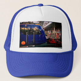 Boné Comboio azul, na estação de Manchester