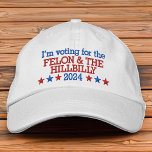 Boné Felon e Hillbilly Funny Trump Vance 2024<br><div class="desc">Trump Vance 2024 citação engraçada. Donald Trump 2024, vou votar no criminoso condenado e no caipira. . O engraçado meme cita o chapéu para o pai do JD Vance e do apoiador Trump, marido, amigo ou qualquer um faz uma declaração ousada. Trump 2024 com estrelas brancas e azuis vermelhas em...</div>