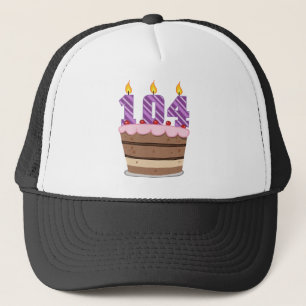 Boné Idade 104 no bolo de aniversário